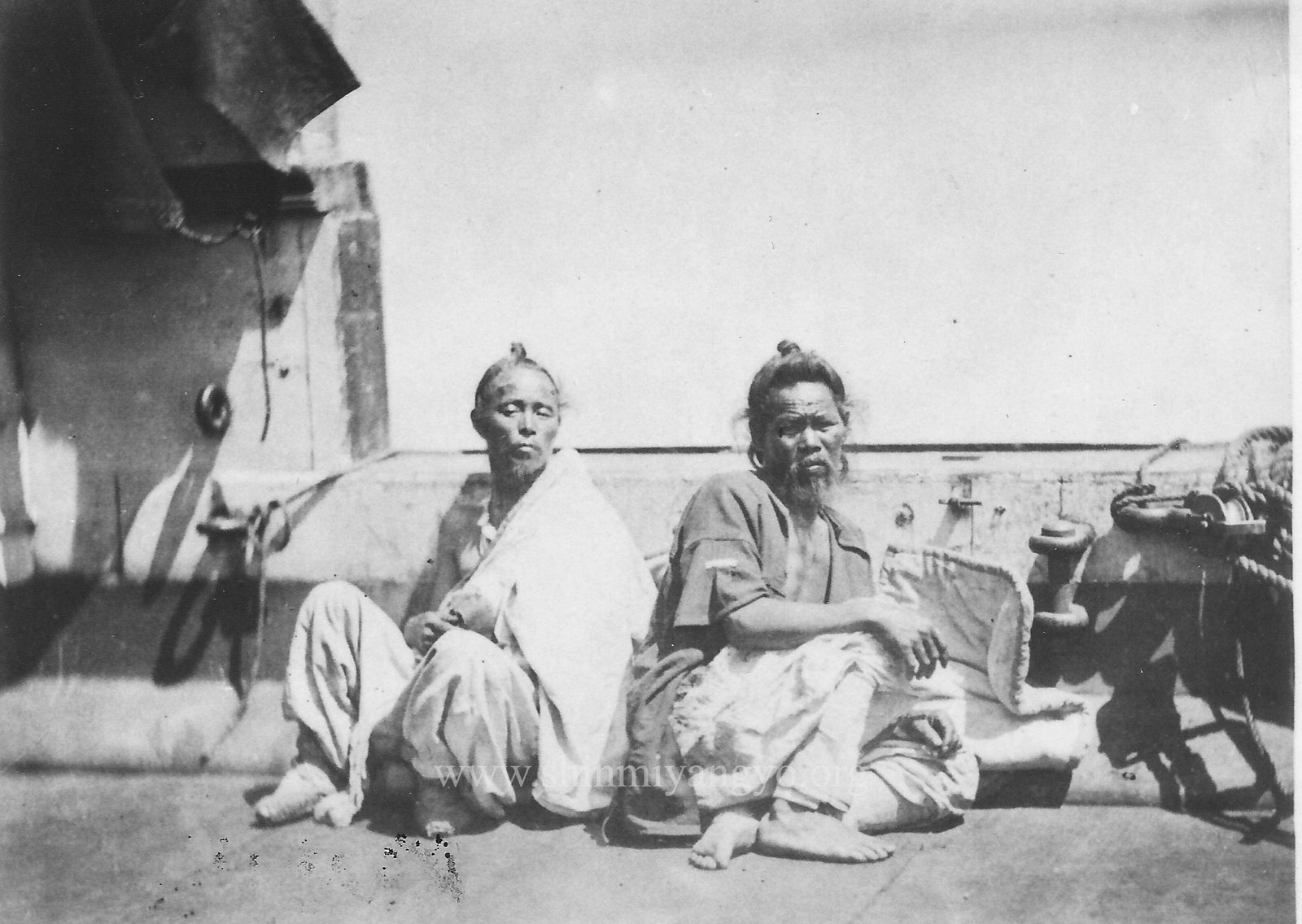 KWG28 "Two Corean wounded prisoners waiting for a visit by the surgeon on board the USS Monocacy"